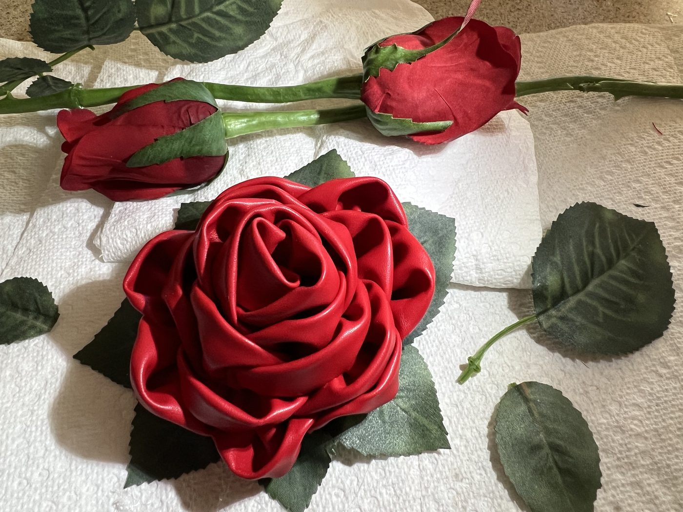 Handmade red satin ribbon rose with rosebuds